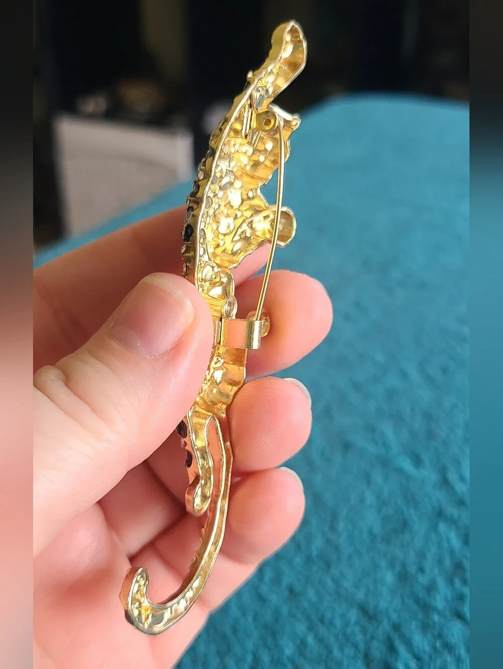 Vintage Gold-Tone Black and Clear Leopard Brooch with Green Eyes